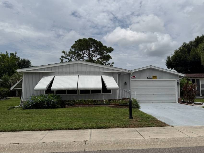 North Fort Myers, FL Mobile Home for Sale located at 737 Via Del Sol Del Tura Golf & Country Club
